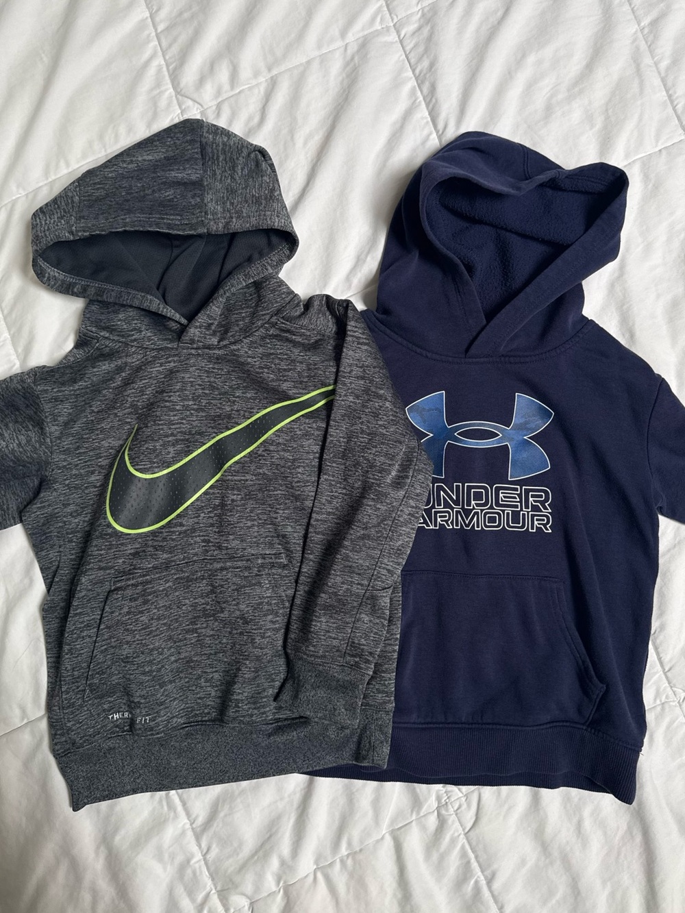 Two size 6 boys hoodies Nike under armour hooded sweatshirts